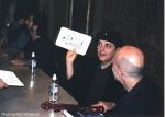 Phil signs a liscense plate a fan made for him