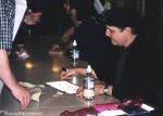 Phil signs the phan's plate